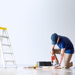 man renovating house with design space